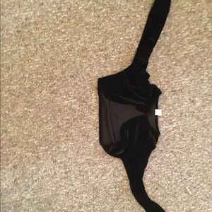 A little sweater that you put over a dress